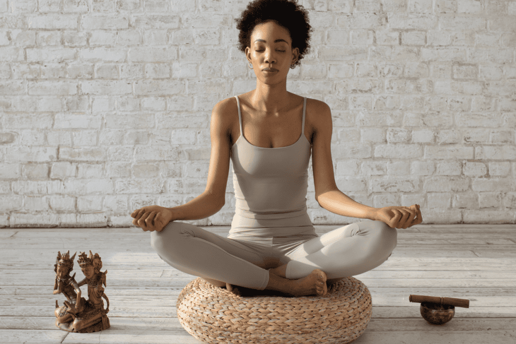 Person practicing mindfulness meditation indoors, illustrating calm awareness and self-reflection—key to understanding why coping skills stop working and learning healthier ways to cope.
